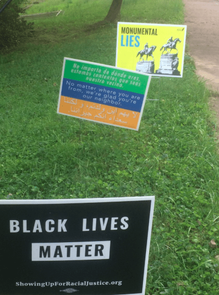 Lawn Signs of "Monumental Lies" poster